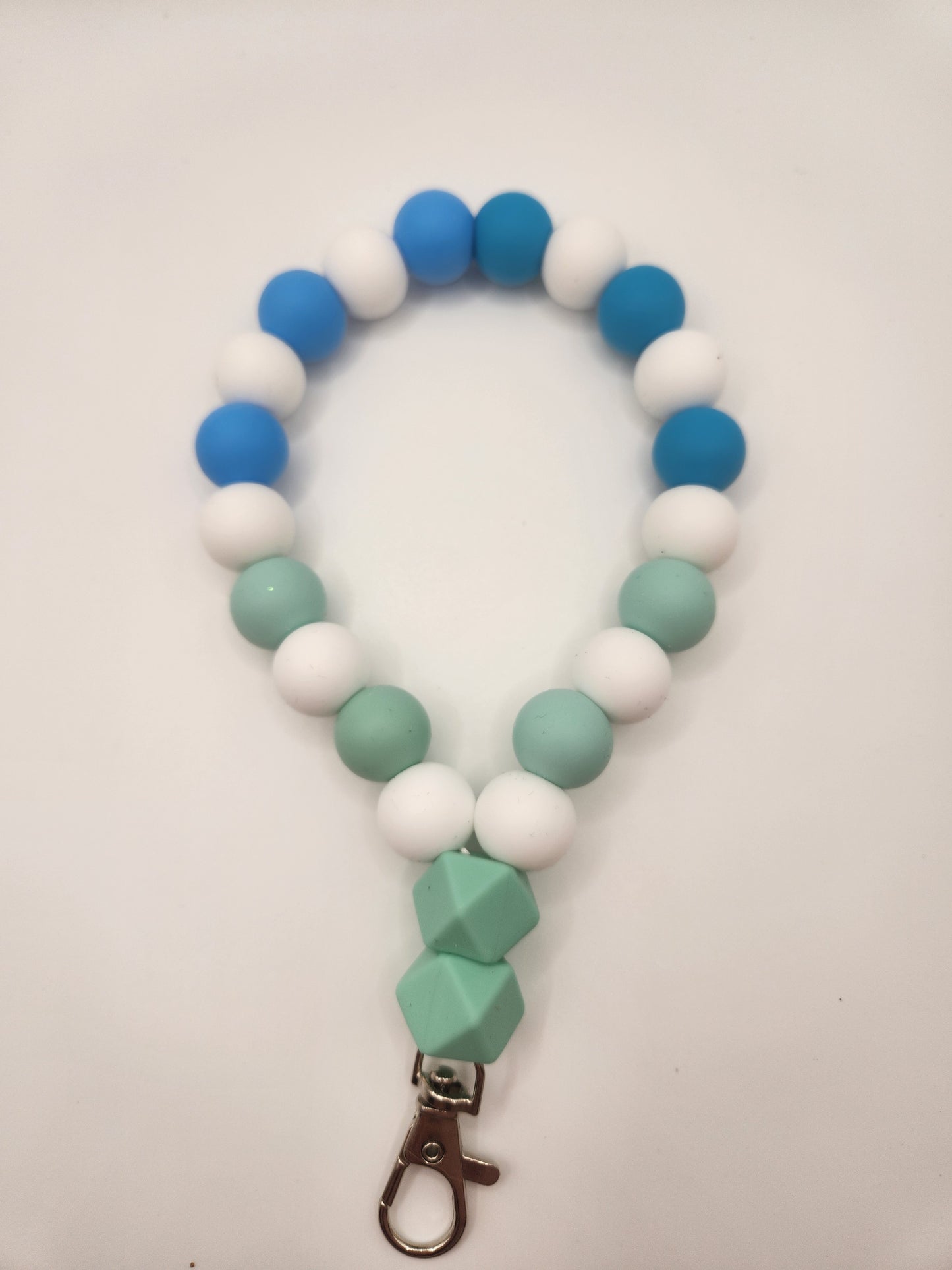 Blue, White, Greenish Blue Phone Holder
